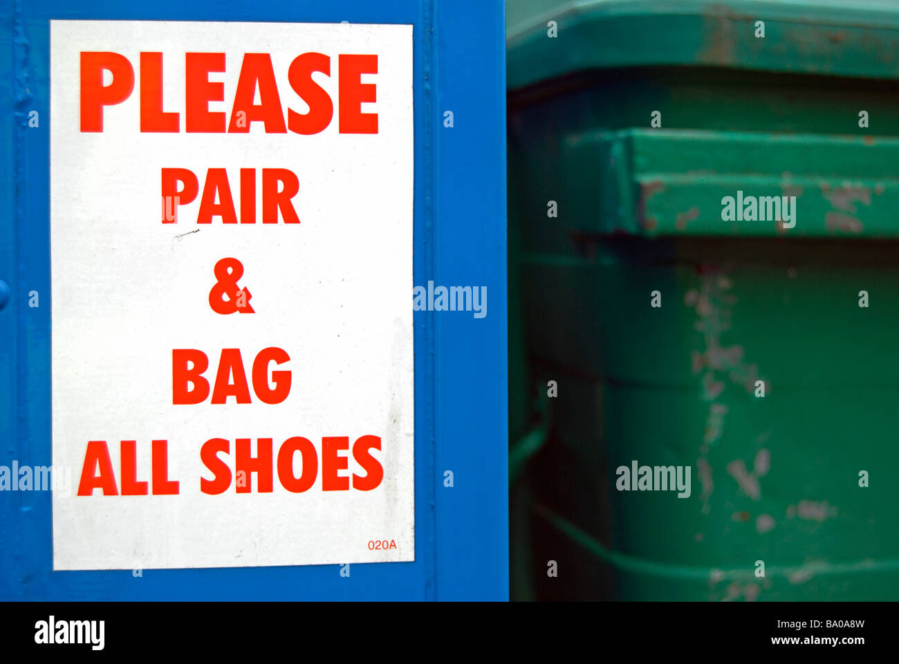 please pair and bag all shoes notice on a shoe recycling bin Stock