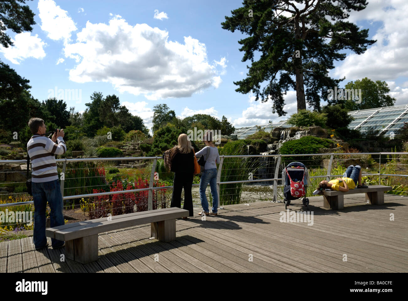 Tourists sightseeing the Royal Botanical Gardens at Kew, London, England Stock Photo