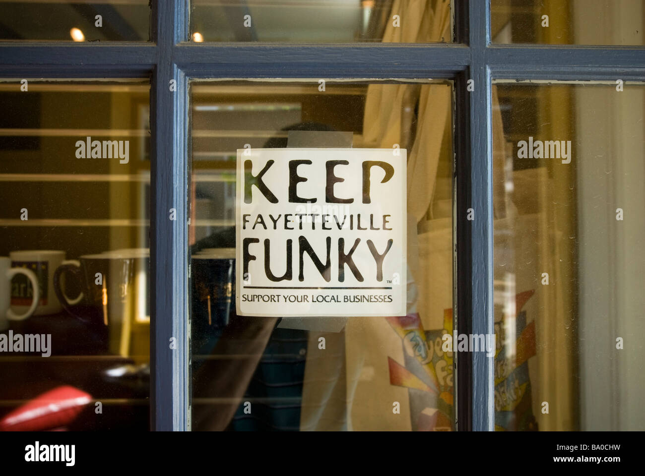 Sticker in a shop window, Fayetteville, Arkansas, United States of America Stock Photo