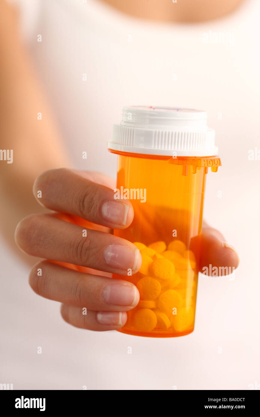 Holding pill bottle hires stock photography and images Alamy