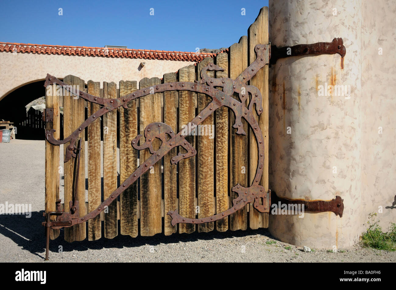 a highly decorative wrought iron western style gate Stock Photo