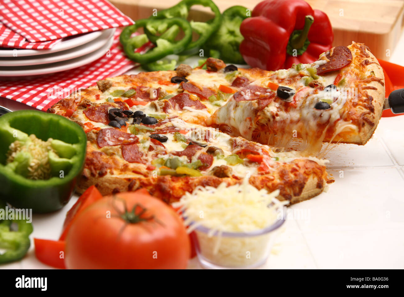 Slice of pizza and ingredients Stock Photo