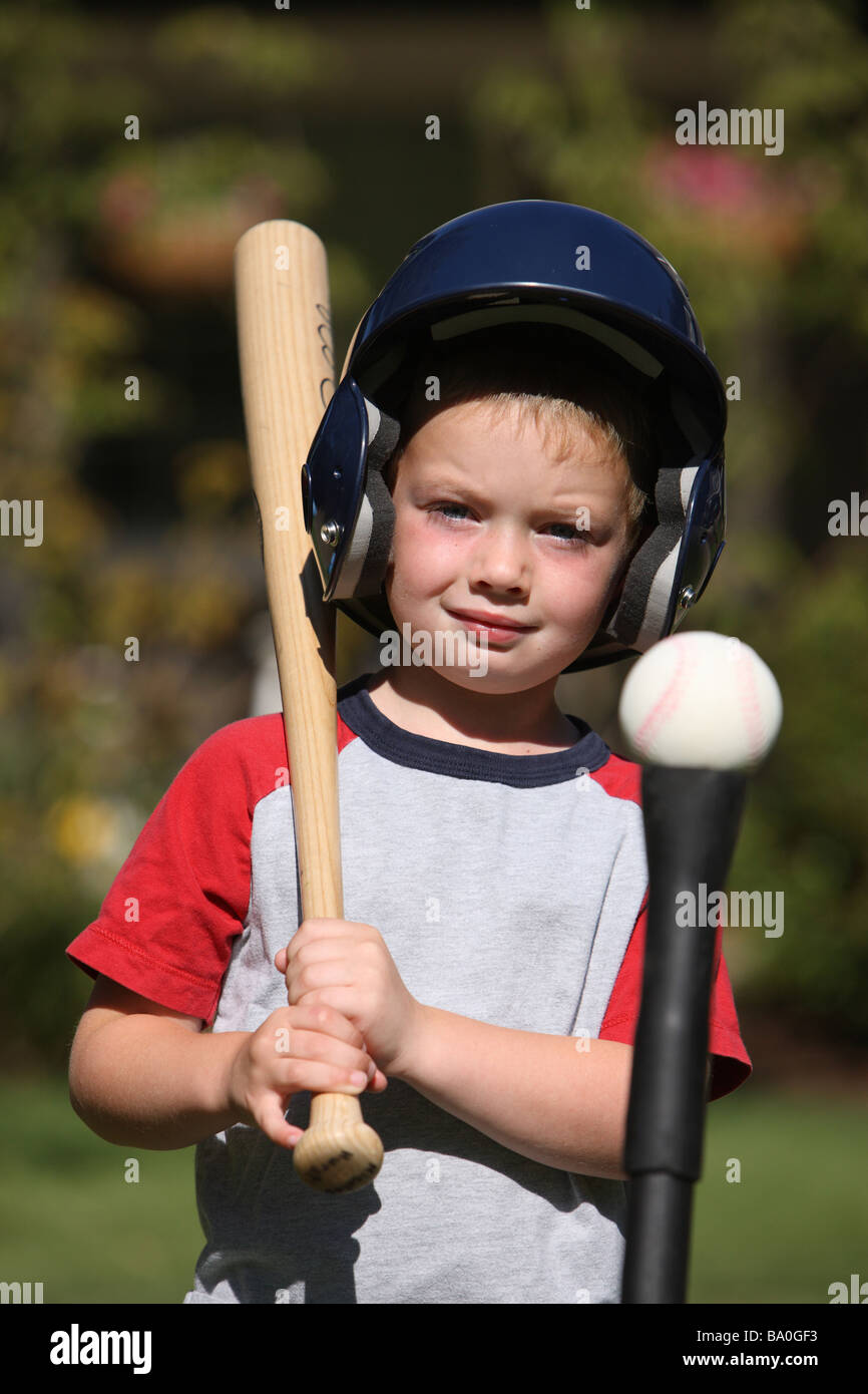 Young boy with t ball bat Stock Photo Alamy