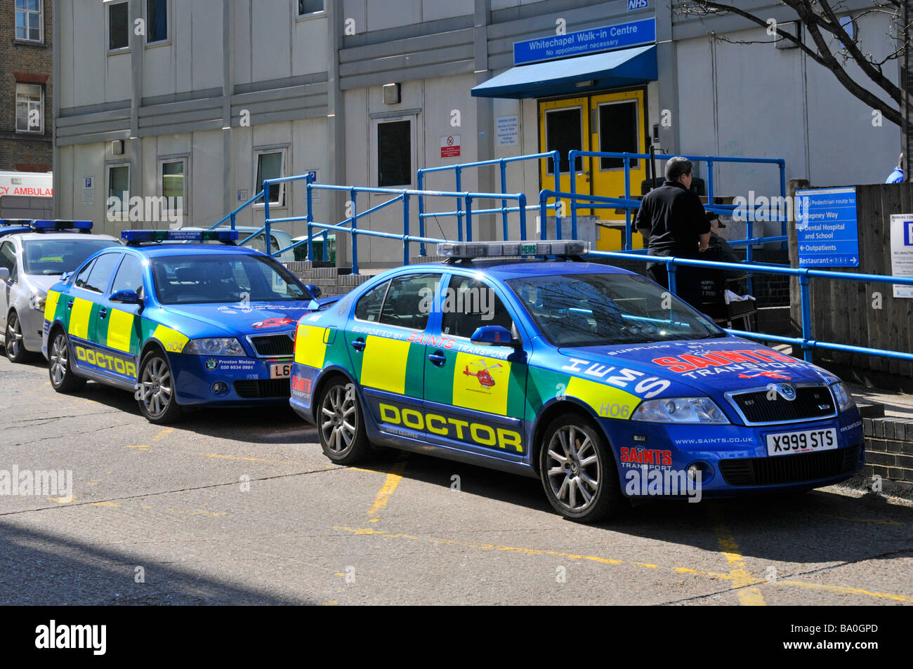 Sponsored Ambulance Doctors cars parked outside Whitechapel NHS walk in centre within the grounds of the Royal London Hospital Stock Photo