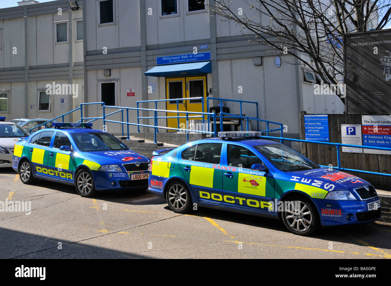 Sponsored Doctors cars parked outside Whitechapel NHS walk in centre within the grounds of the Royal London Hospital Stock Photo
