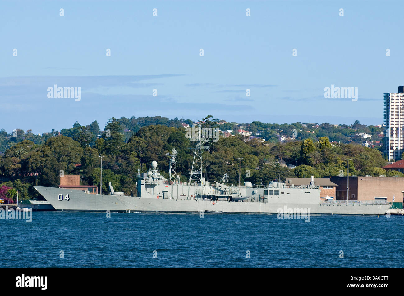 HMAS Darwin, an Adelaide Class guided missile frigate, docked at Garden Island fleet base (HMAS Kuttabul), Sydney, Australia Stock Photo