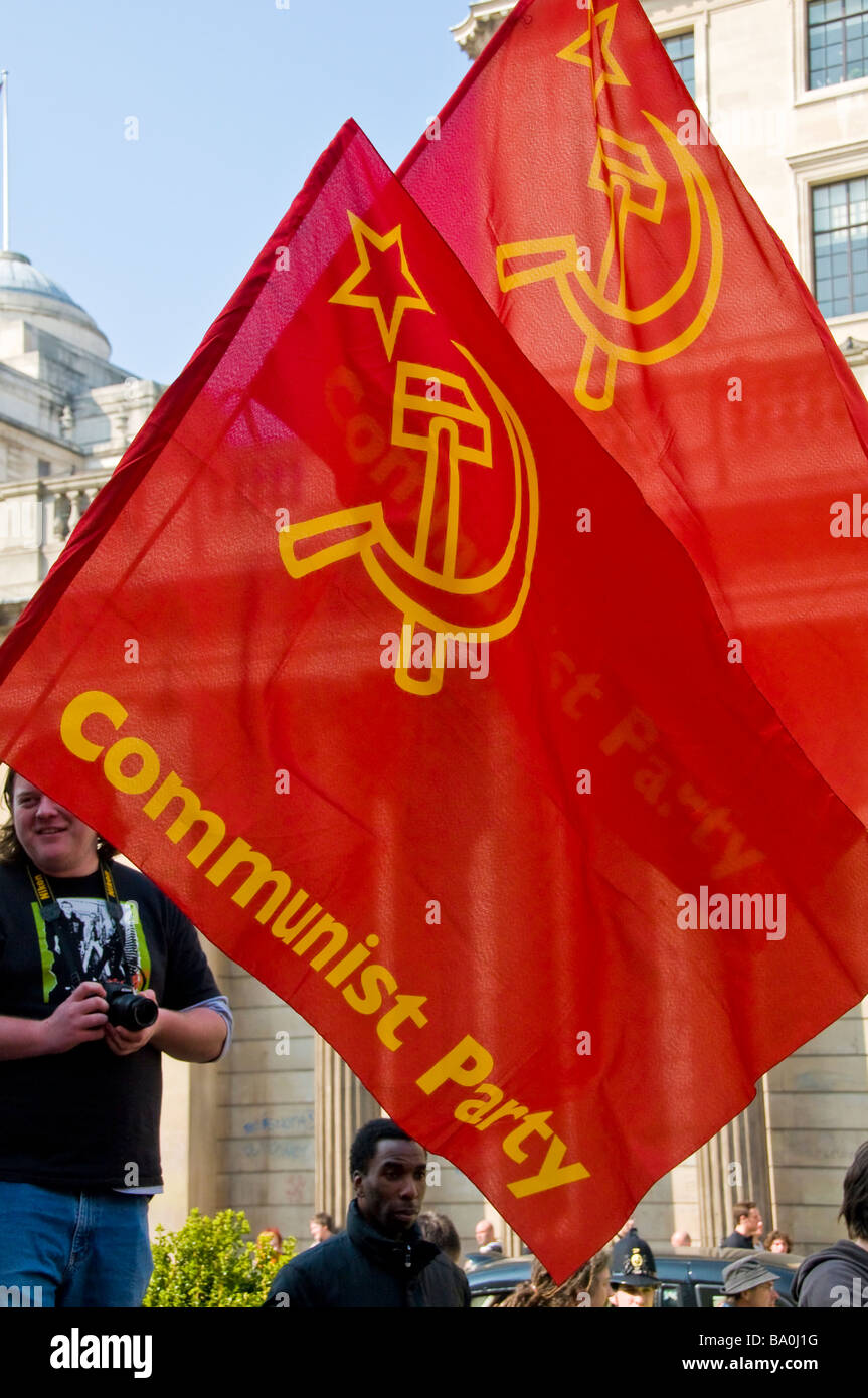 Two communist party flags outside the Bank of England at the G20 Summit protests, London, England, UK Stock Photo