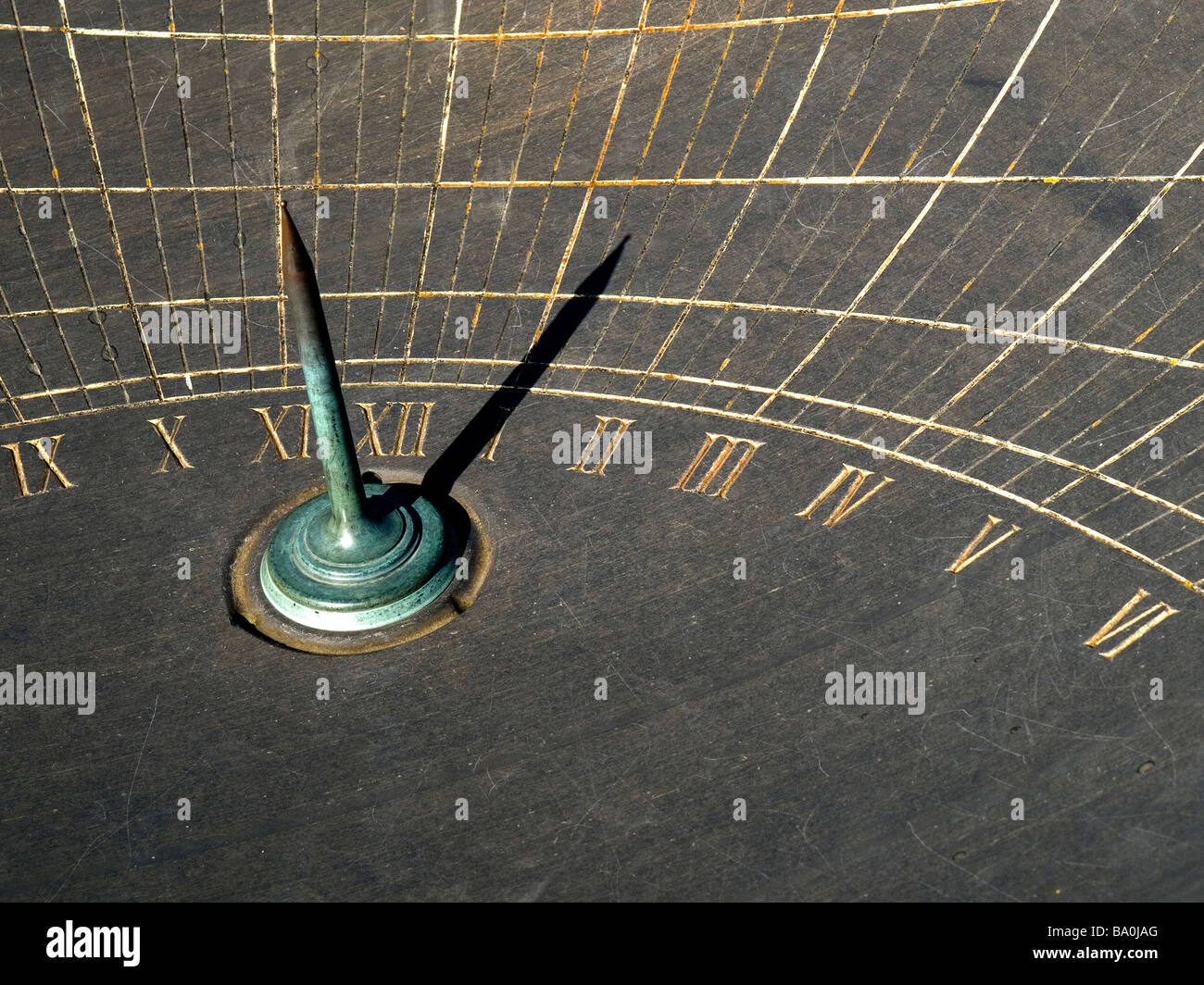 The gnomon in the giant bowl shaped slate sundial at Holker Hall Cark in Cartmel Cumbria UK Stock Photo