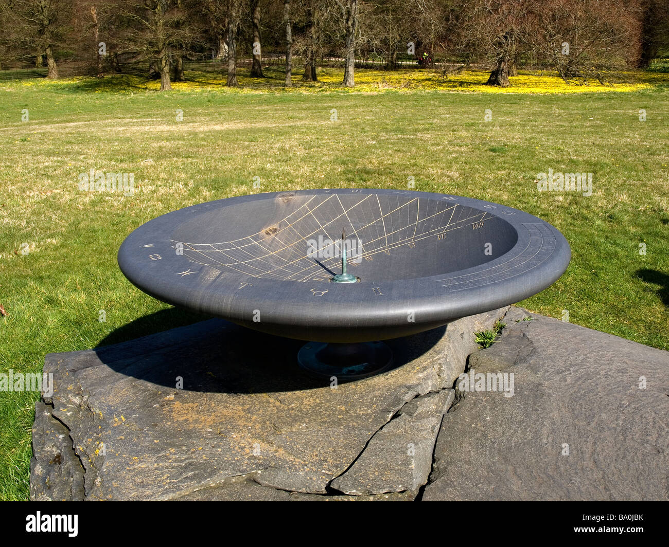 The giant bowl shaped slate sundial at Holker Hall Cark in Cartmel Cumbria UK Stock Photo