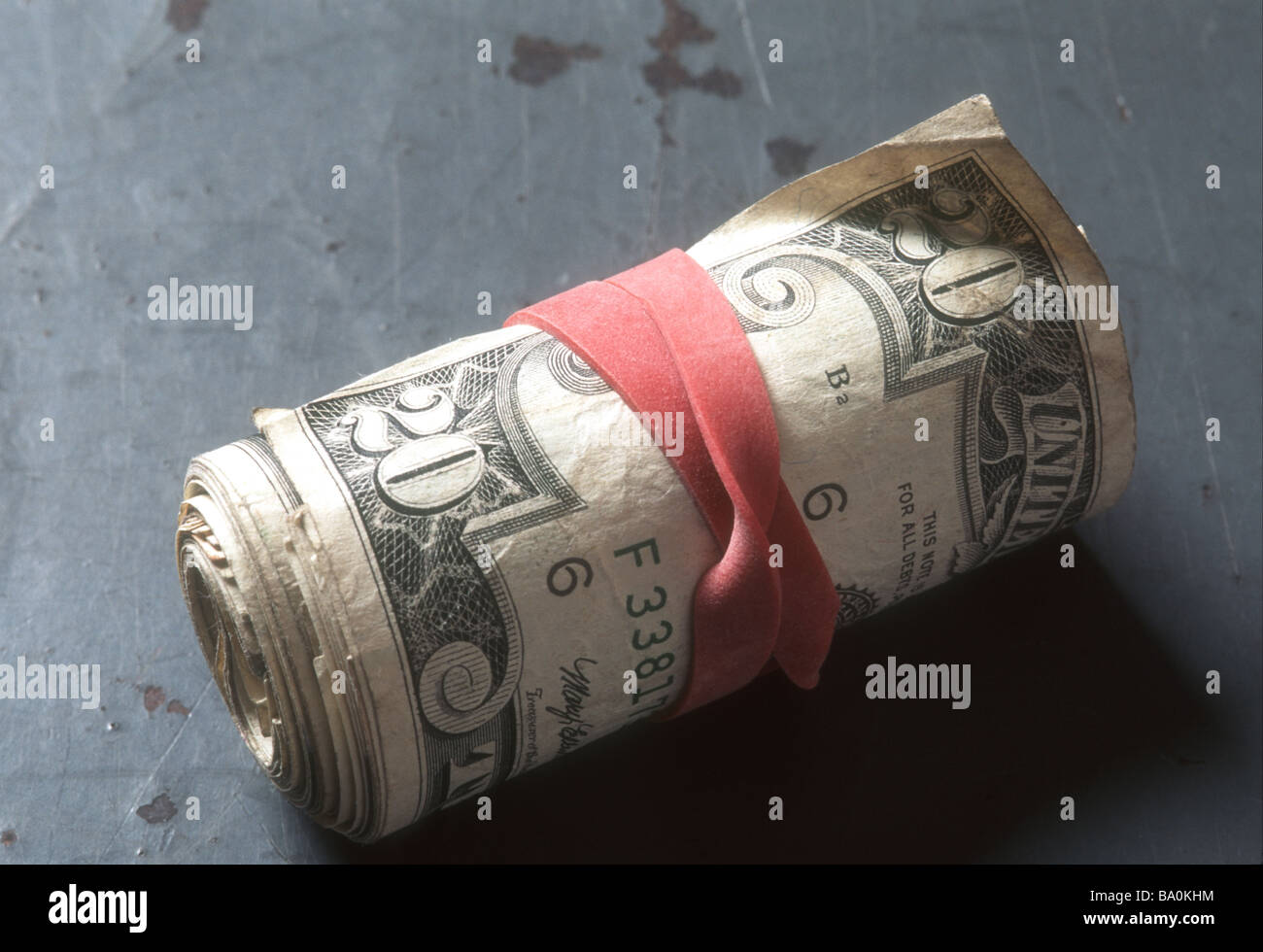dirty roll of twenty dollar bills US Stock Photo