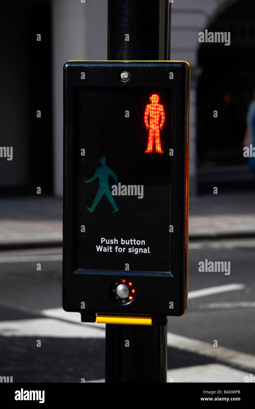A hand operated pelican crossing at traffic lights in Richmond, Surrey. March 2009 Stock Photo