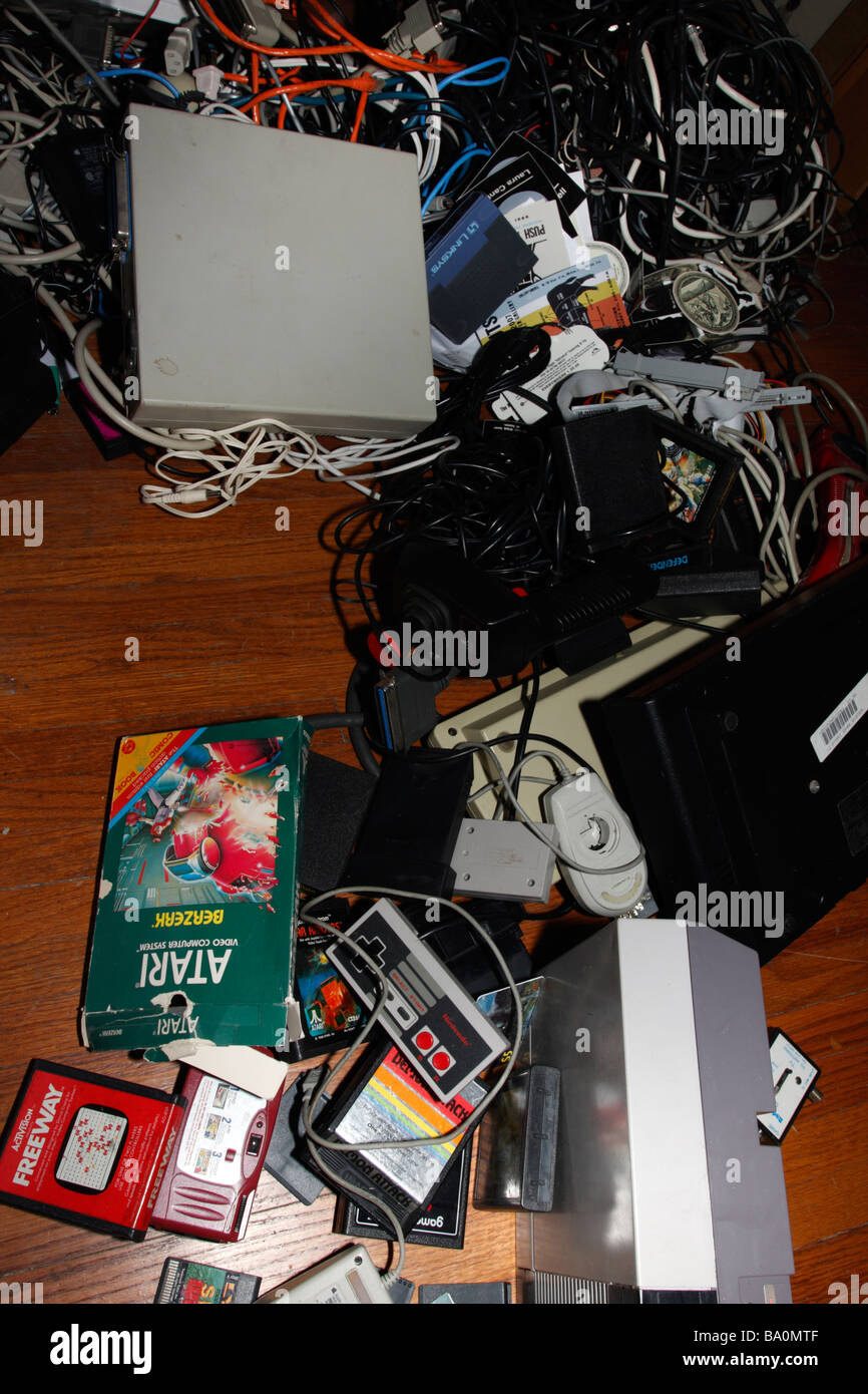 Pile of old video games and electronics Classics Obsolete Stock Photo