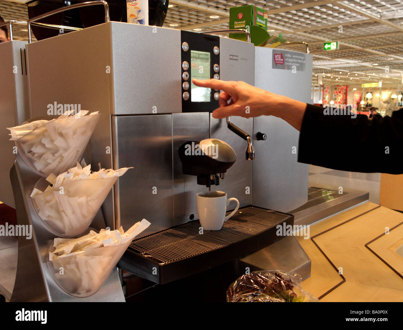 Woman Making a Selection on a Automatic Coffee Machine Stock Photo Alamy