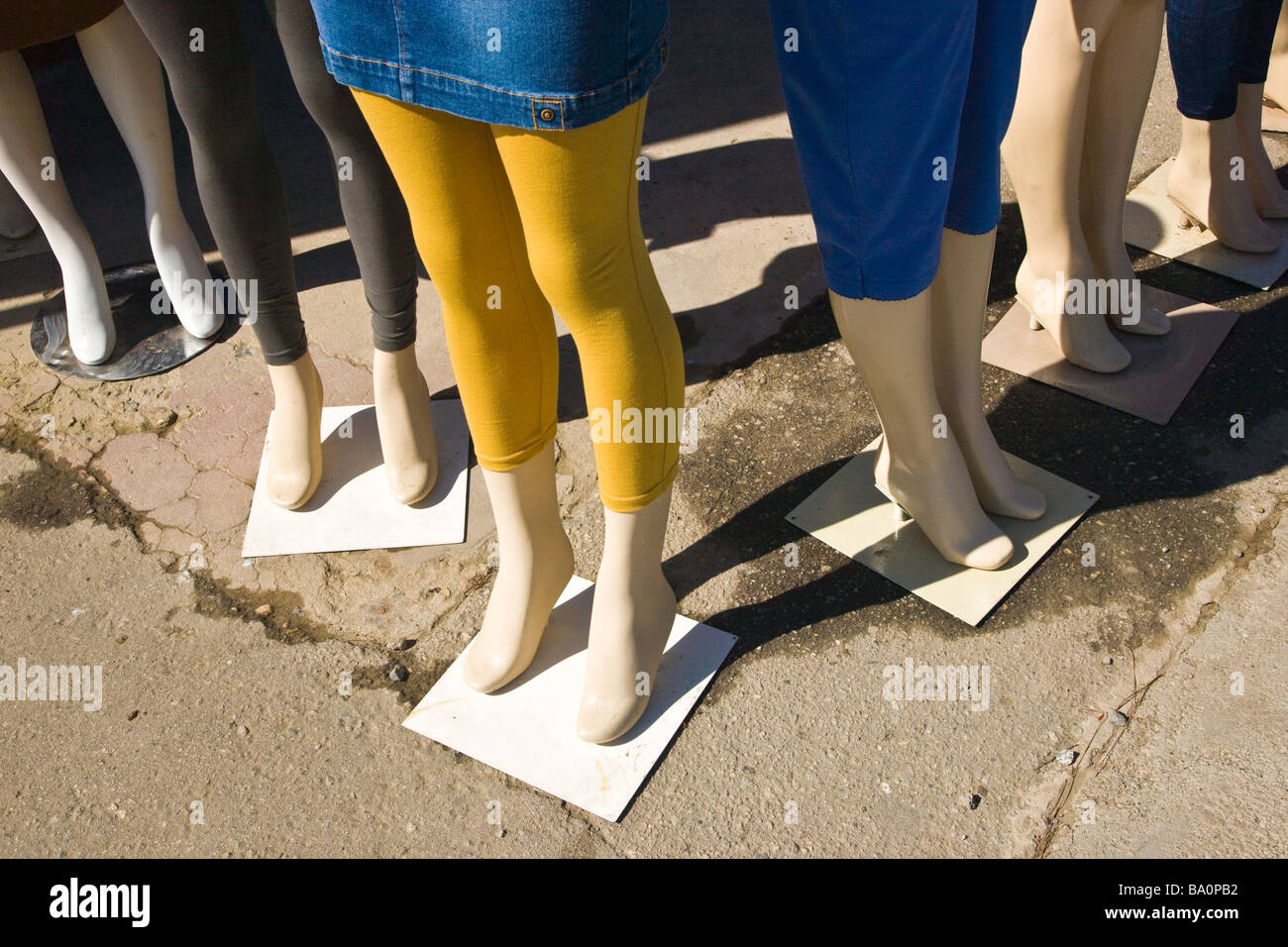 Legs of female mannequins wearing skirt & tights. Stock Photo