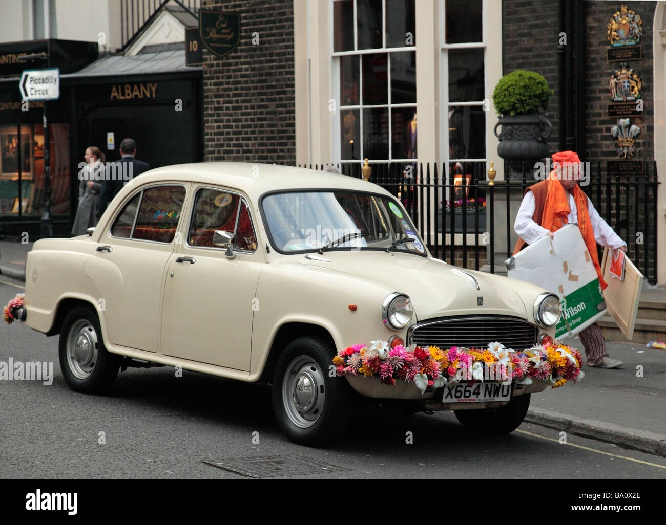 A Hindustan Ambassador minicab of Karma Kars in central London. Stock Photo
