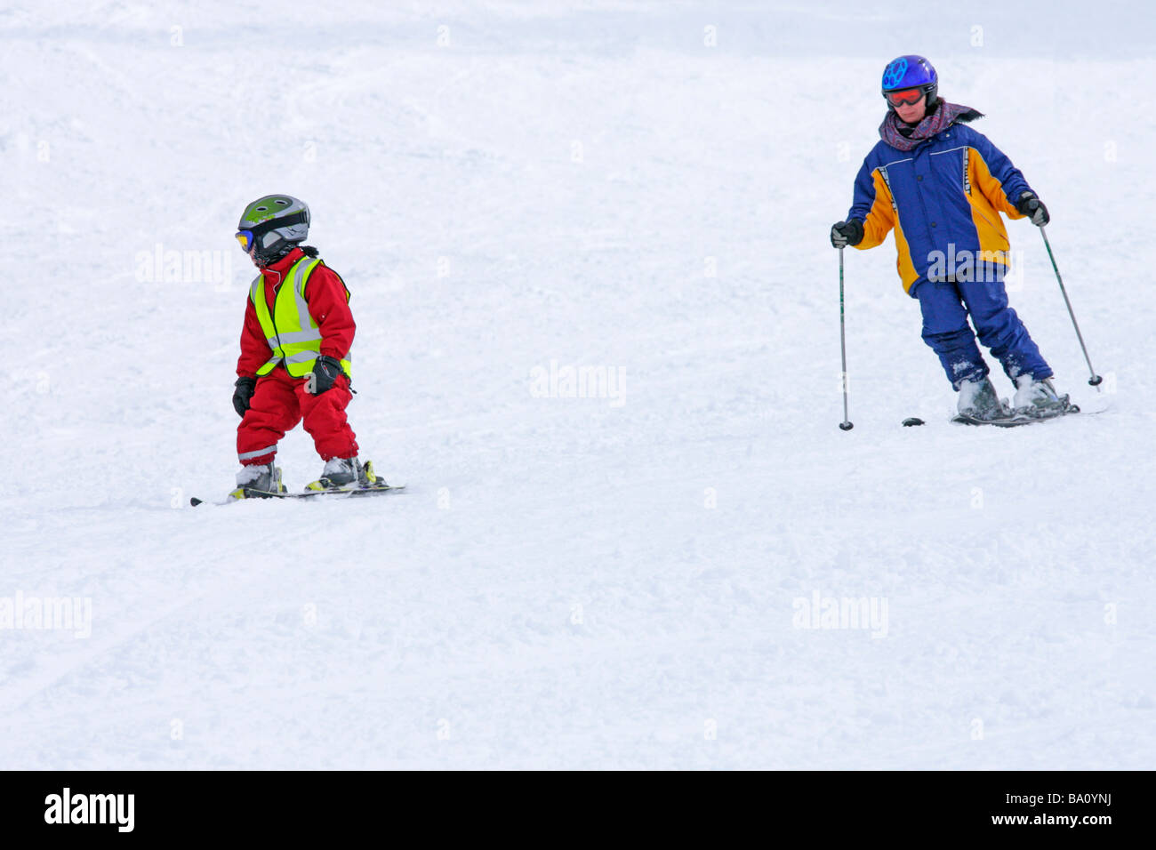 a family Alpine skiing on Reiteralm in Styria, Austria Stock Photo