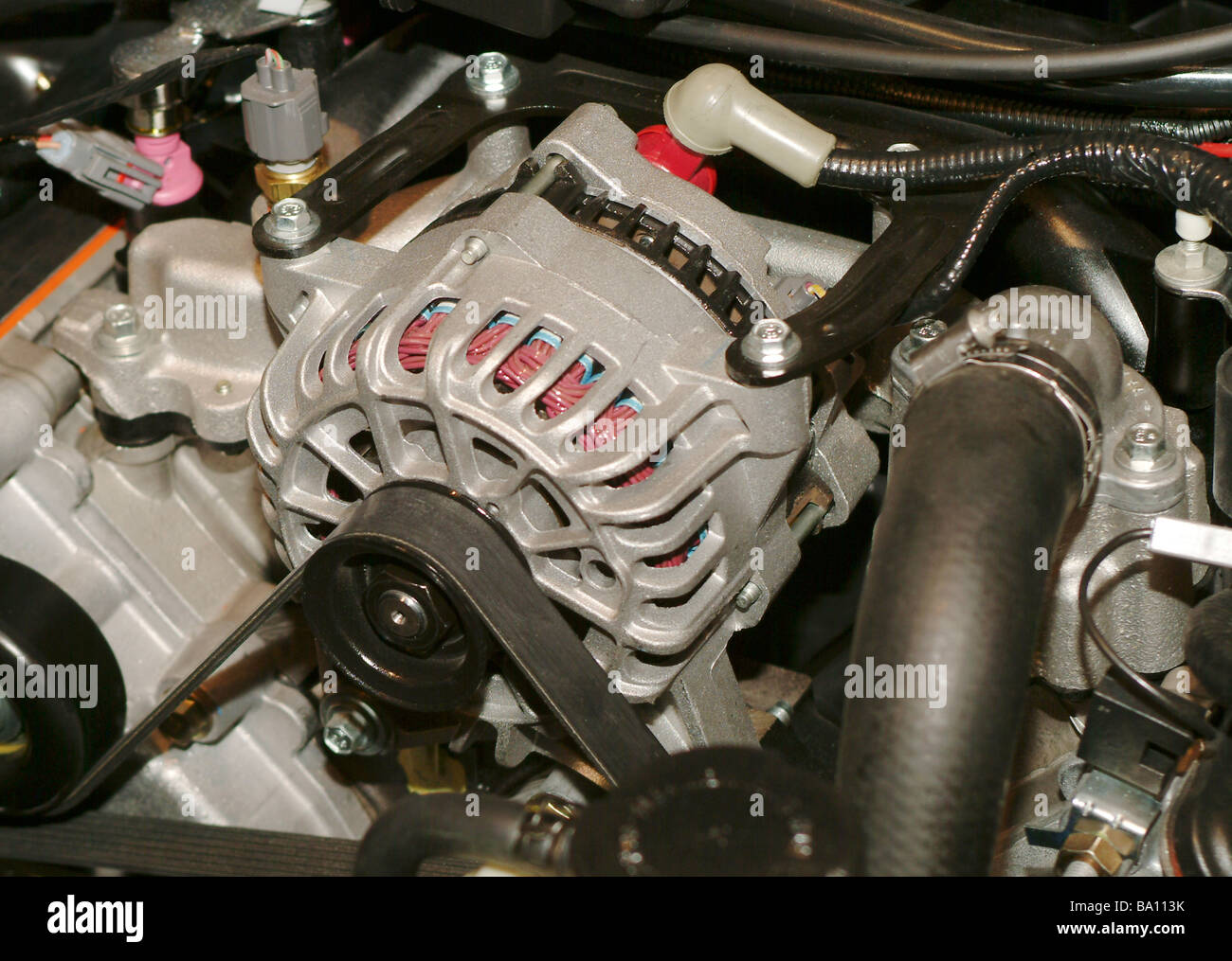 Alternator on a car engine Stock Photo Alamy