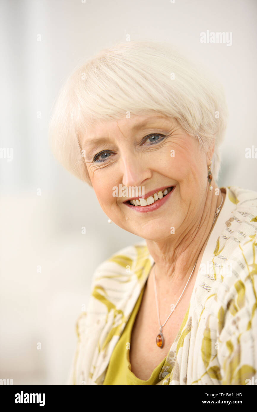 Close woman home smiling hi-res stock photography and images - Alamy