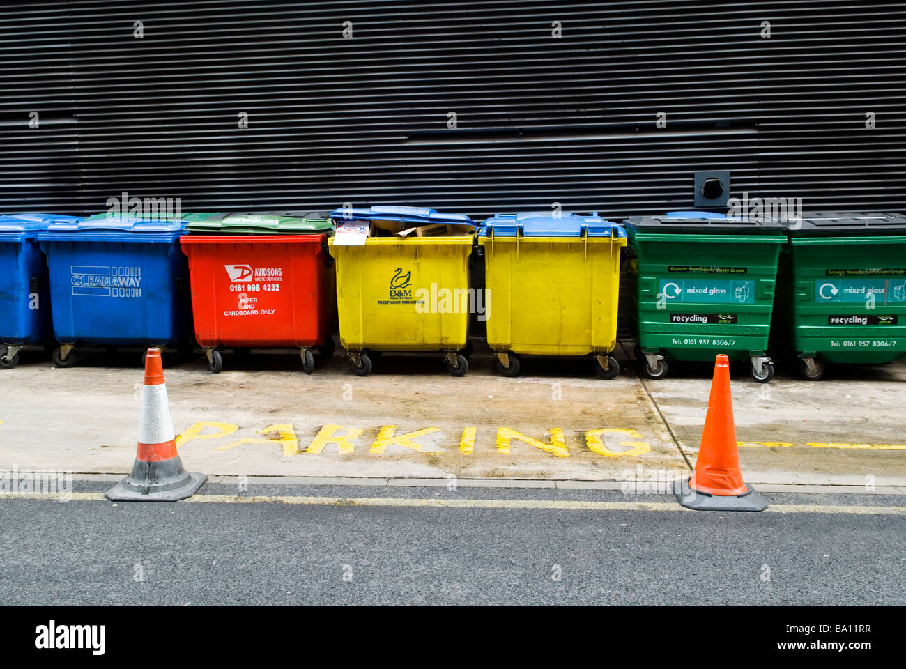 Recycle bins in Manchester city centre UK Stock Photo