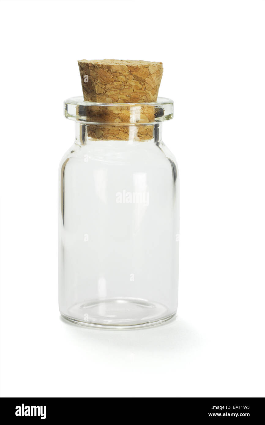 Glass container with cork stopper on white background Stock Photo