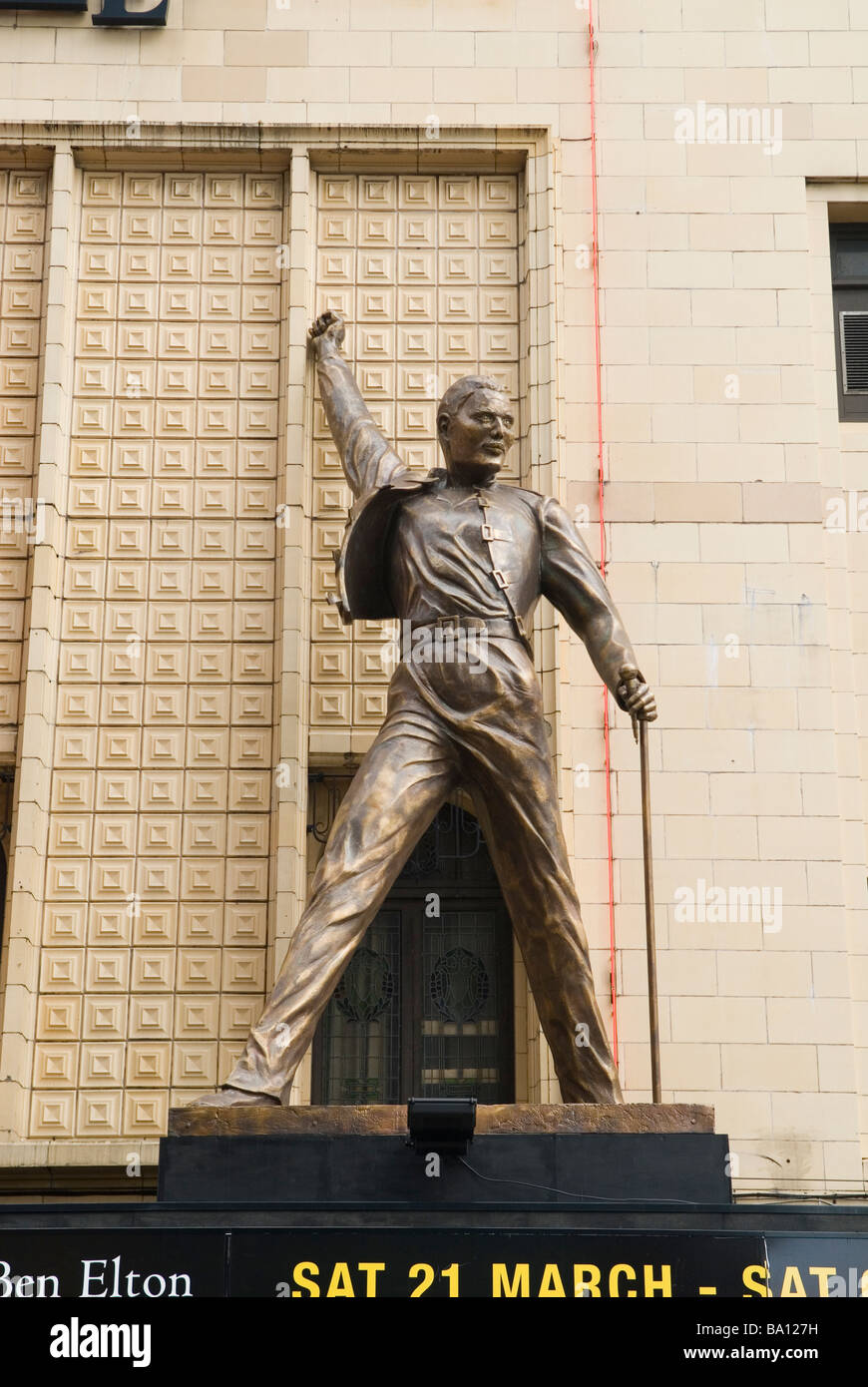 Man statue at the Palace Theatre Manchester city centre UK Stock Photo