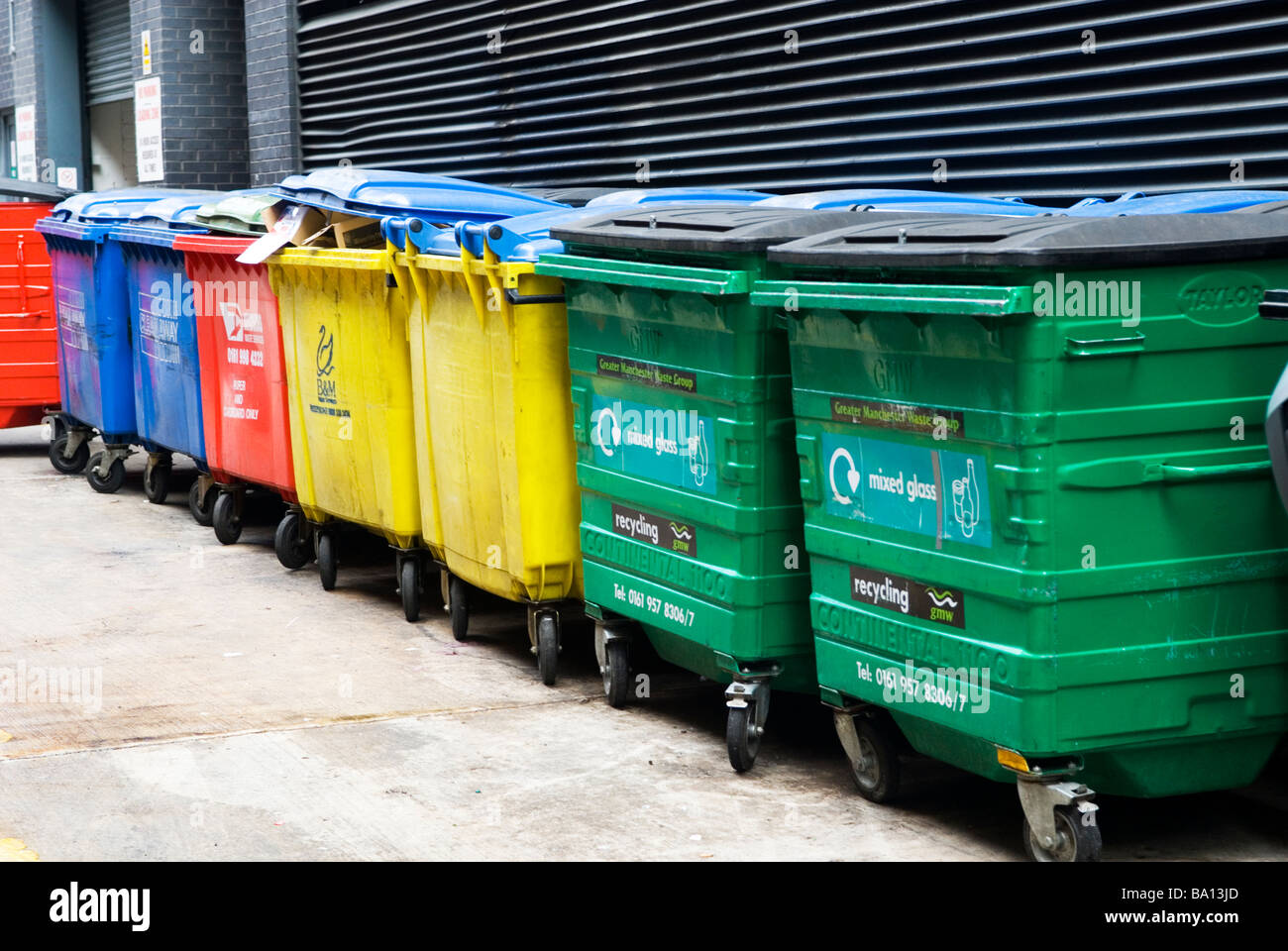 Colourful waste bins in Manchester city centre UK Stock Photo Alamy