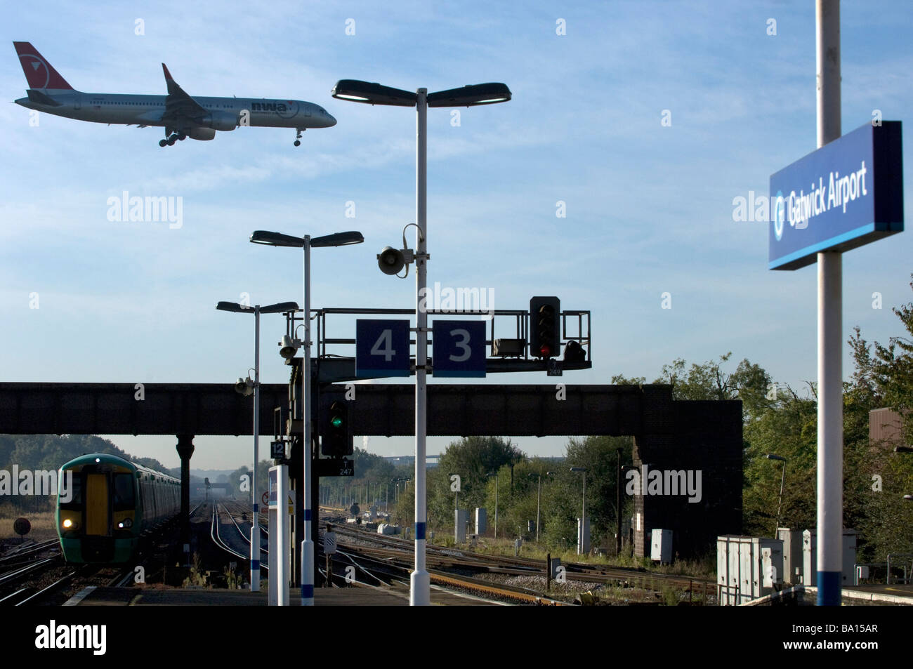Landing wheels are down as a North West Airways Jet Airplane lands