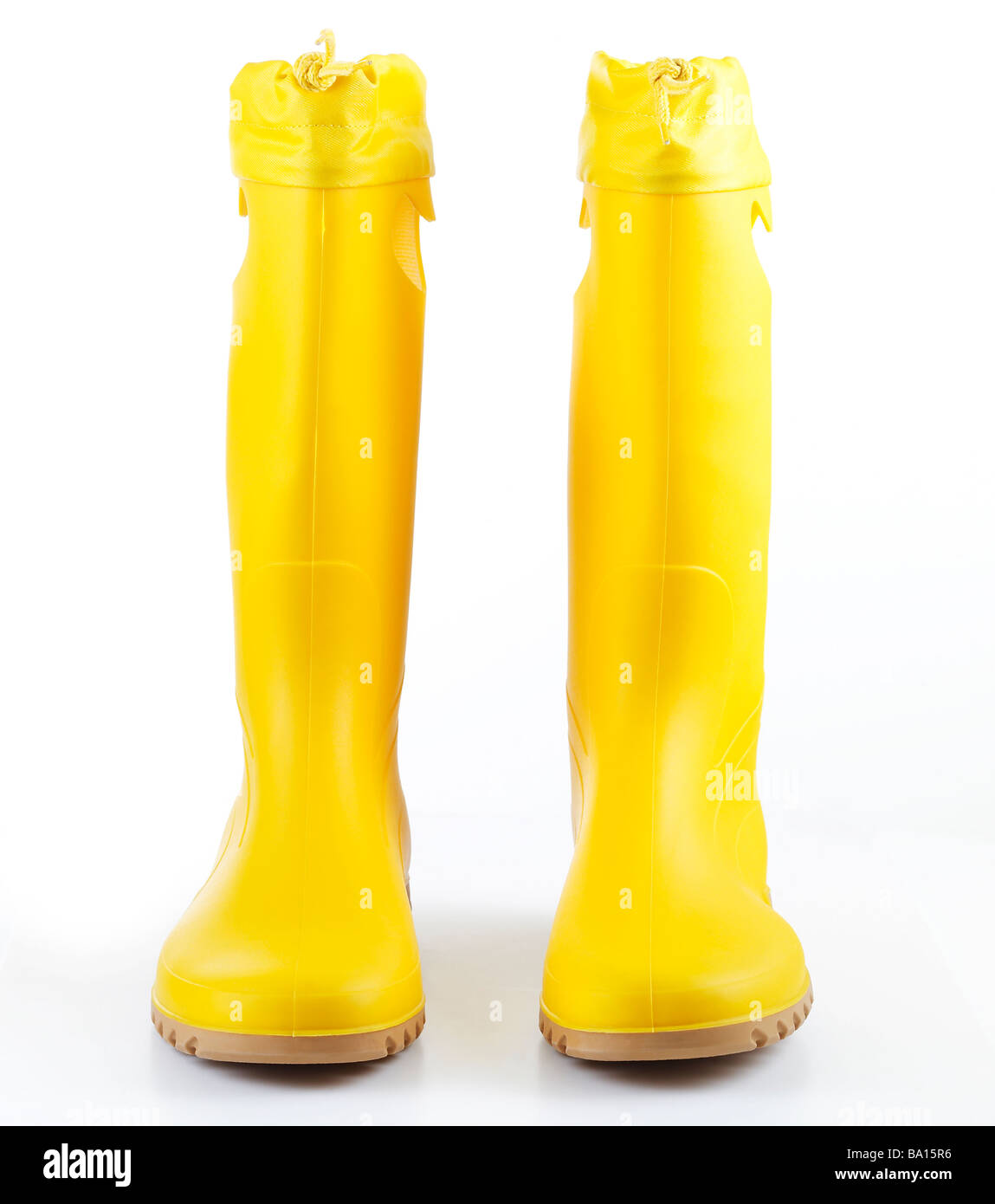 Yellow womens rain boots on white background Stock Photo