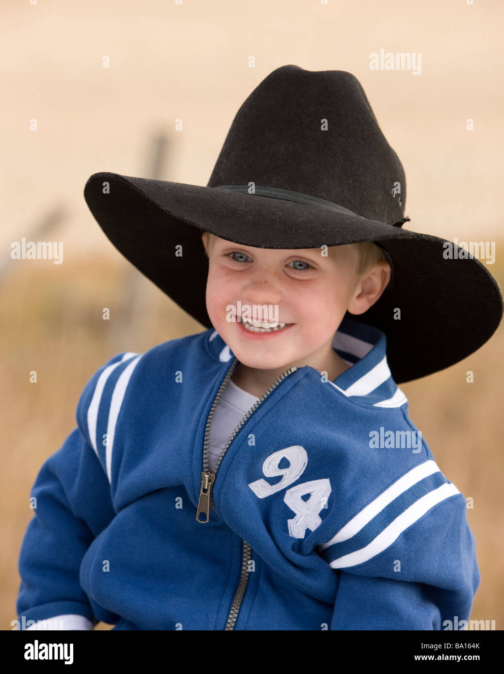 Little boy with a big hat Stock Photo