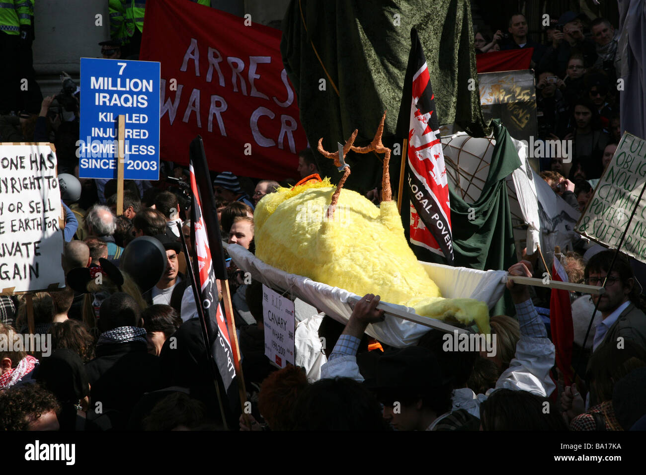 A giant dead canary at the G20 protests in London Stock Photo