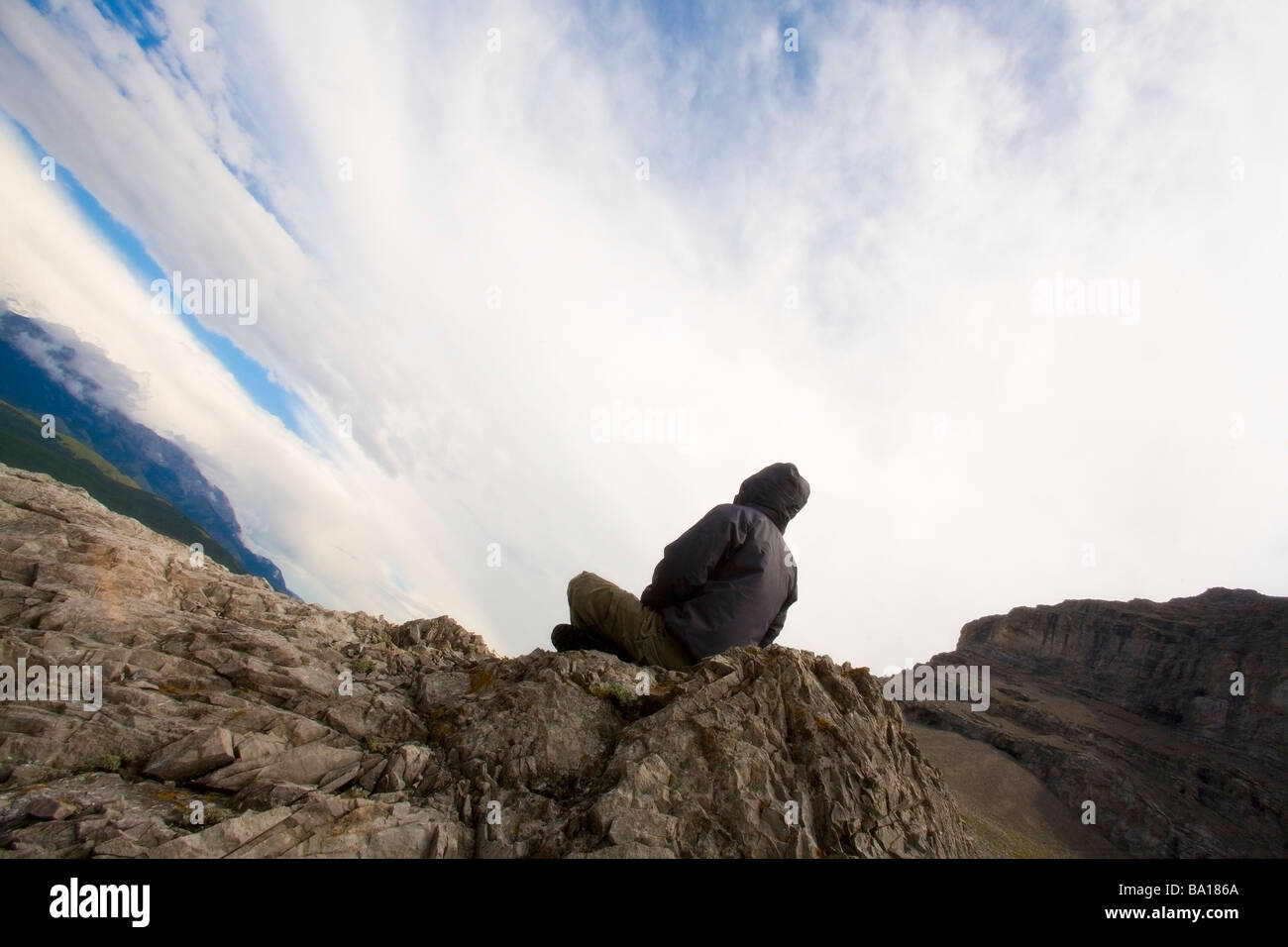 Man meditating on mountain top hi-res stock photography and images - Alamy
