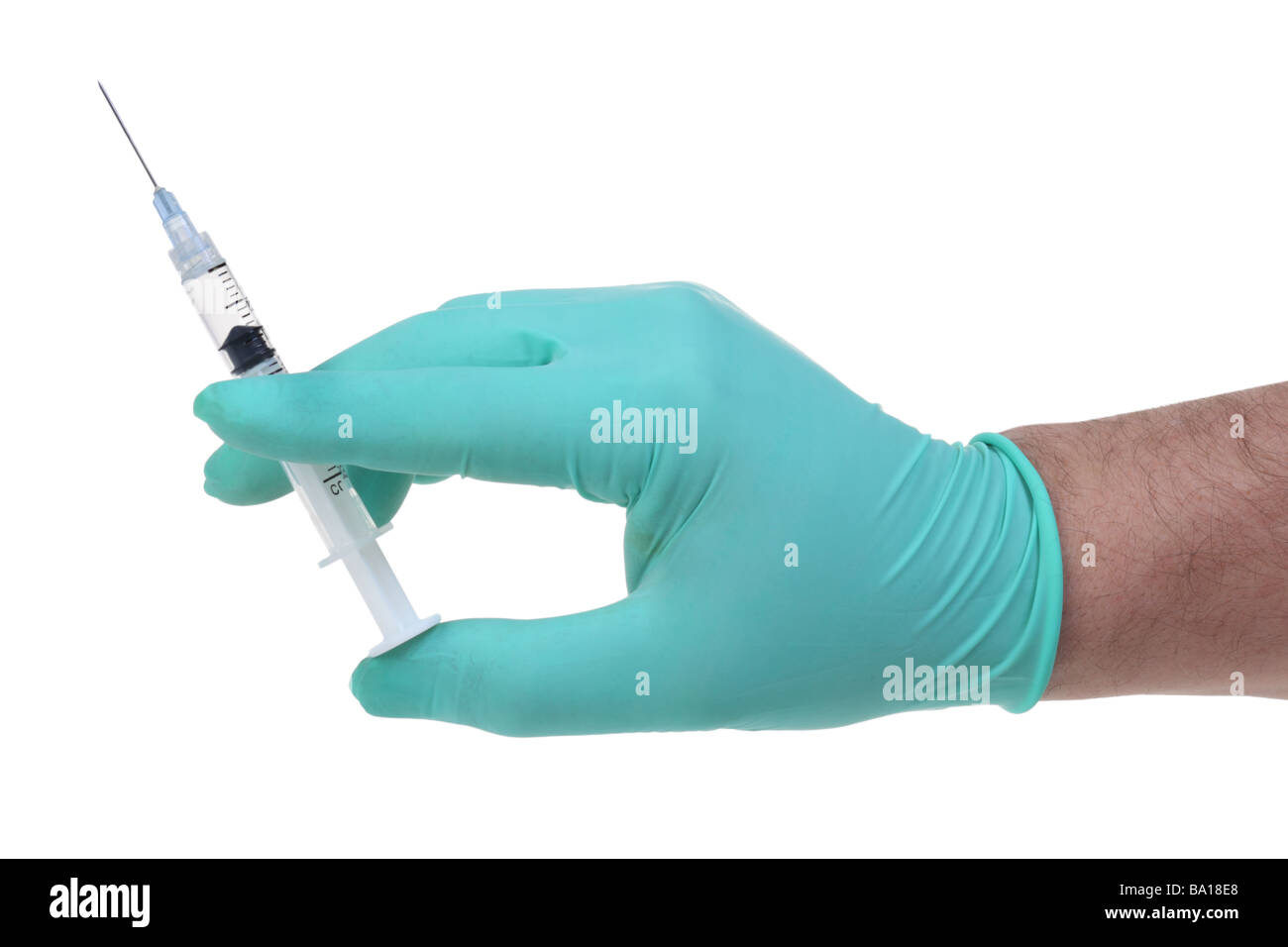 Hand with syringe cutout on white background Stock Photo