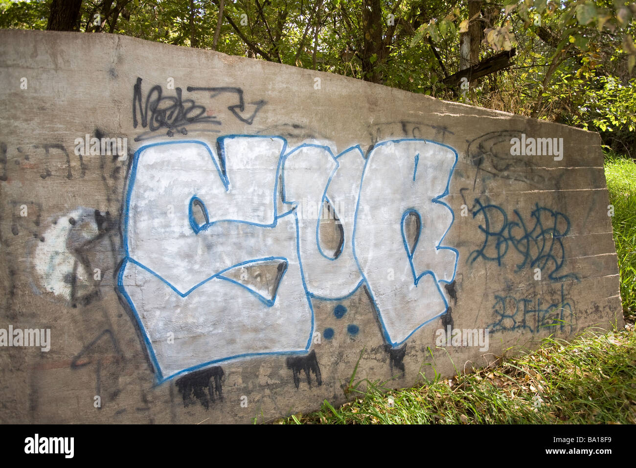 Gang grafitti in rural USA. Gangs are migrating from inner cities to rural communities. Stock Photo