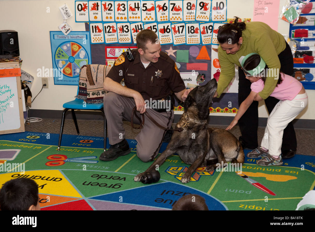 Deputy Sheriff and K-9 visiting a kindergarten class in Crete, Nebraska. Stock Photo