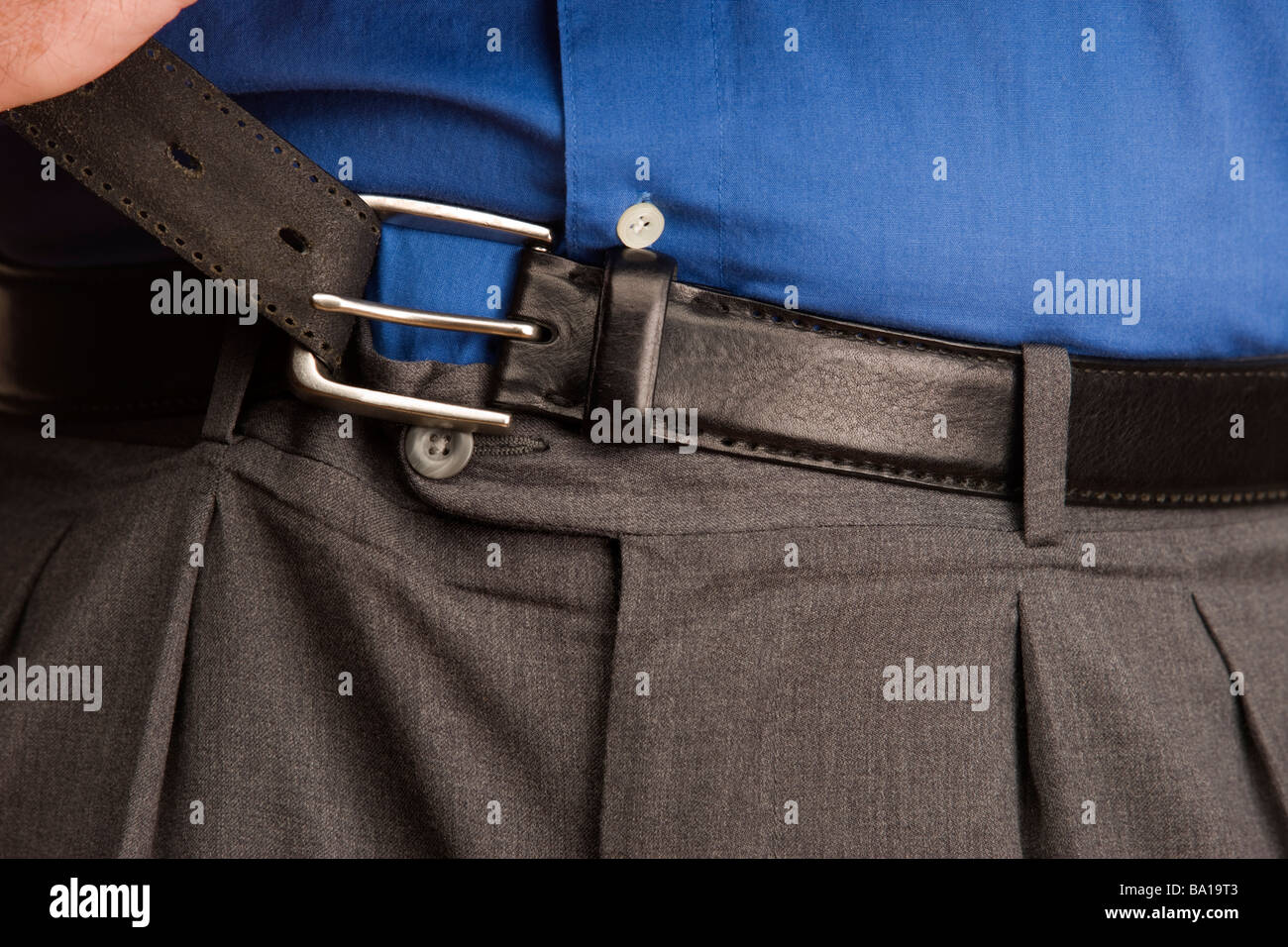 Tighten belt hi-res stock photography and images - Alamy