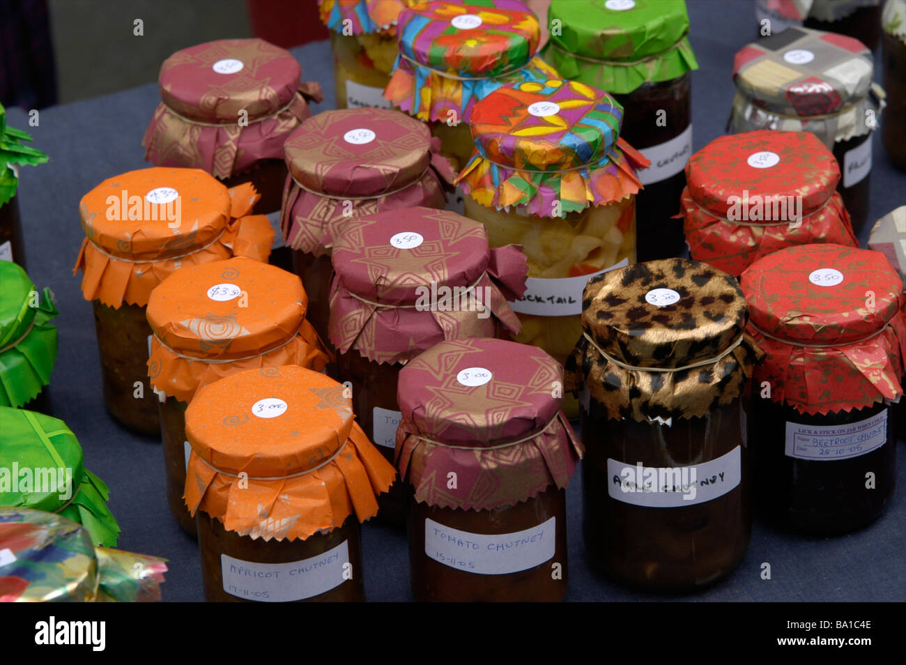Homemade fruit pots and coloured lids, Wellington, New Zealand Stock