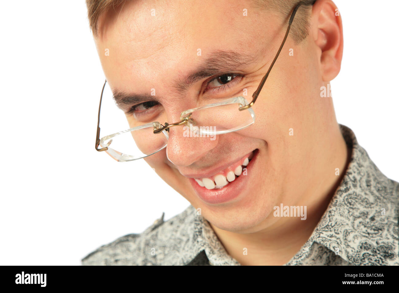 Smiling young man in glasses Stock Photo - Alamy
