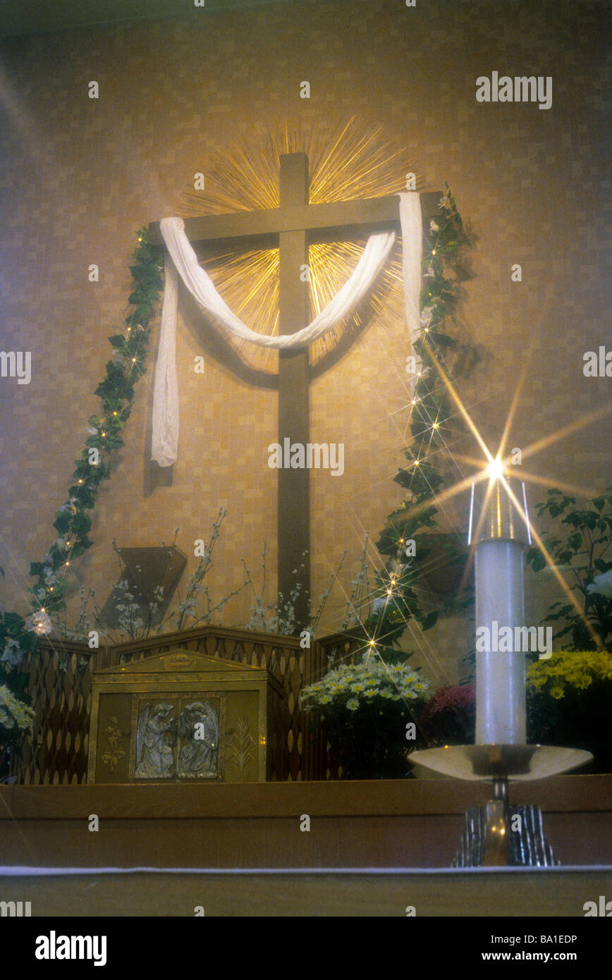 Cross altar cloth church Easter candle Catholic mass Stock Photo