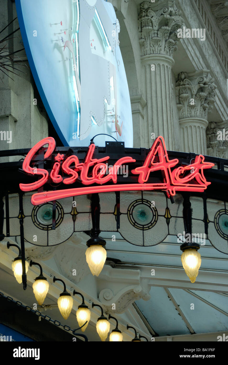 Neon sign advertising the musical Sister Act outside the London Palladium Theatre London Stock Photo