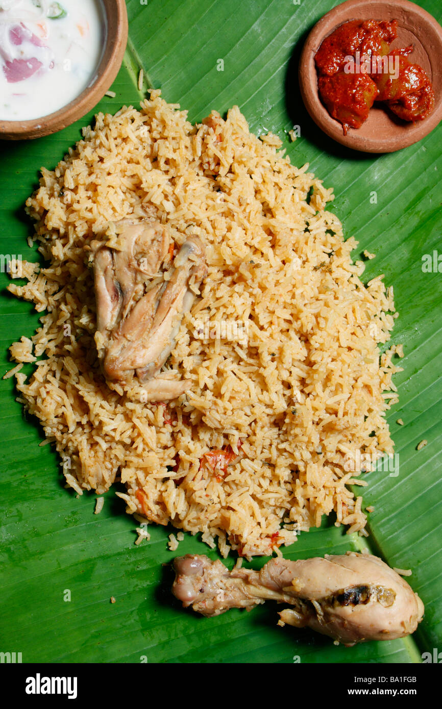 Kerala Style Biryani is a rice dish made with fried chicken/mutton and