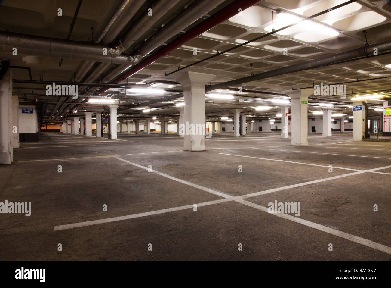 Empty underground multi storey carpark with empty parking bays at The Forum, Chester, England, Uk Stock Photo