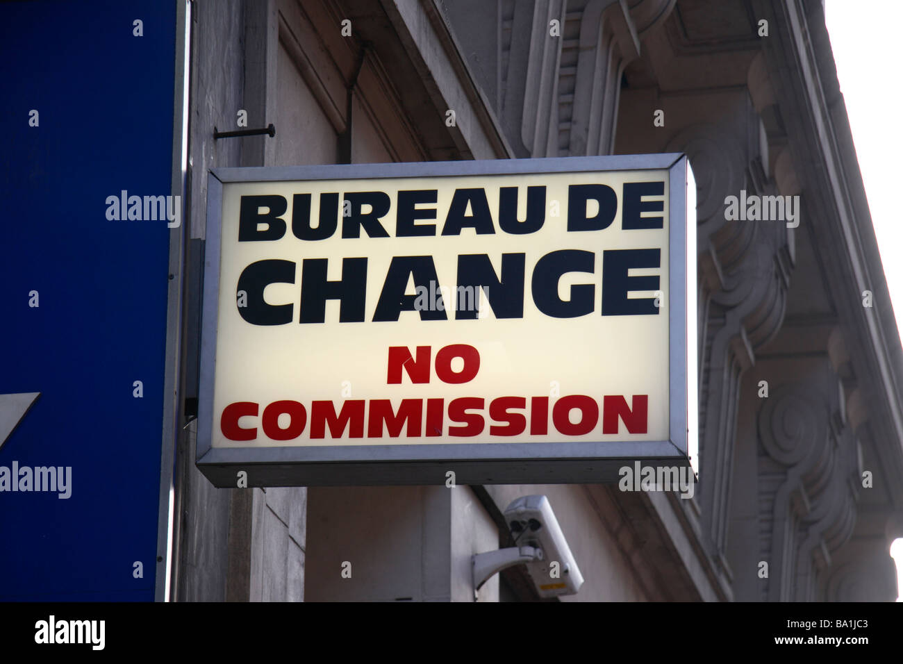 A generic 'Bureau de Change No Commission' sign above a shop on Oxford Street London. Stock Photo