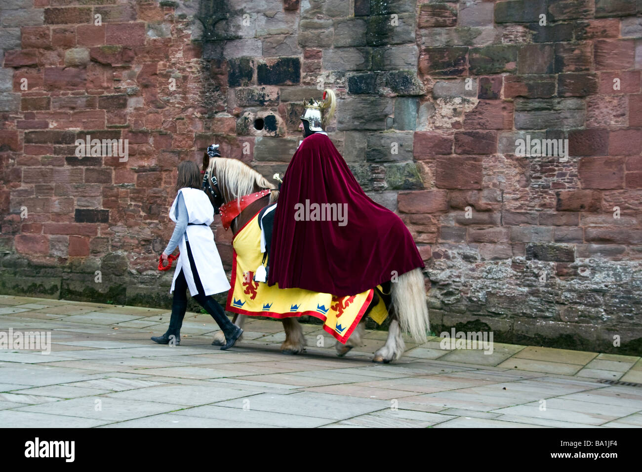 King Robert Bruce on horseback alongside Arbroath Abbey walls during the re-enactment of Scottish Independence of 1320. Stock Photo