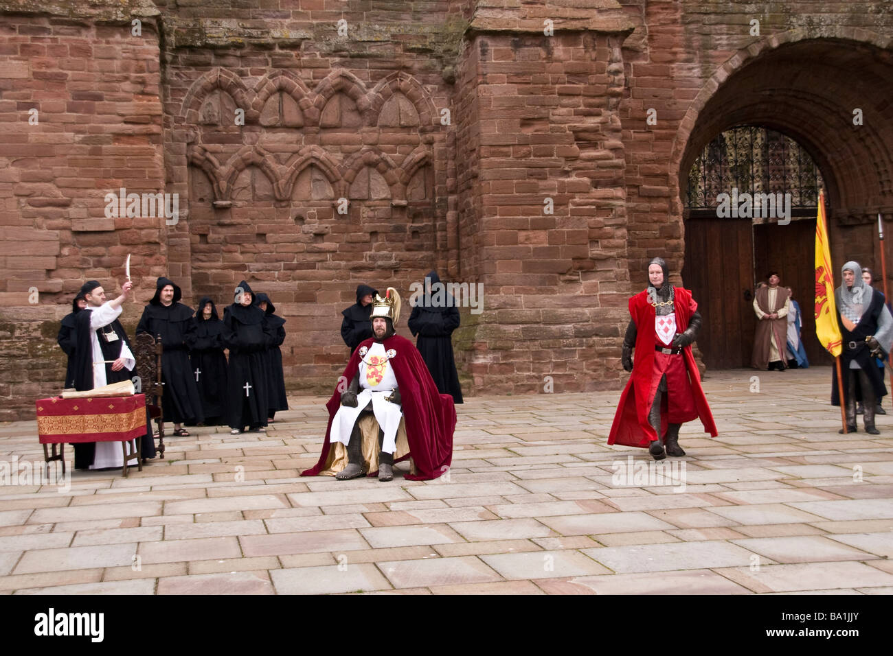 King Robert The Bruce witnesses the 1320 Declaration of Independence being signed at Arbroath Abbey during the re-enactment,UK Stock Photo