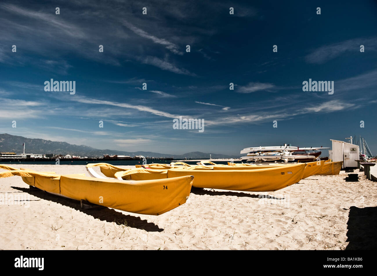 Kayaks on the beach Stock Photo - Alamy
