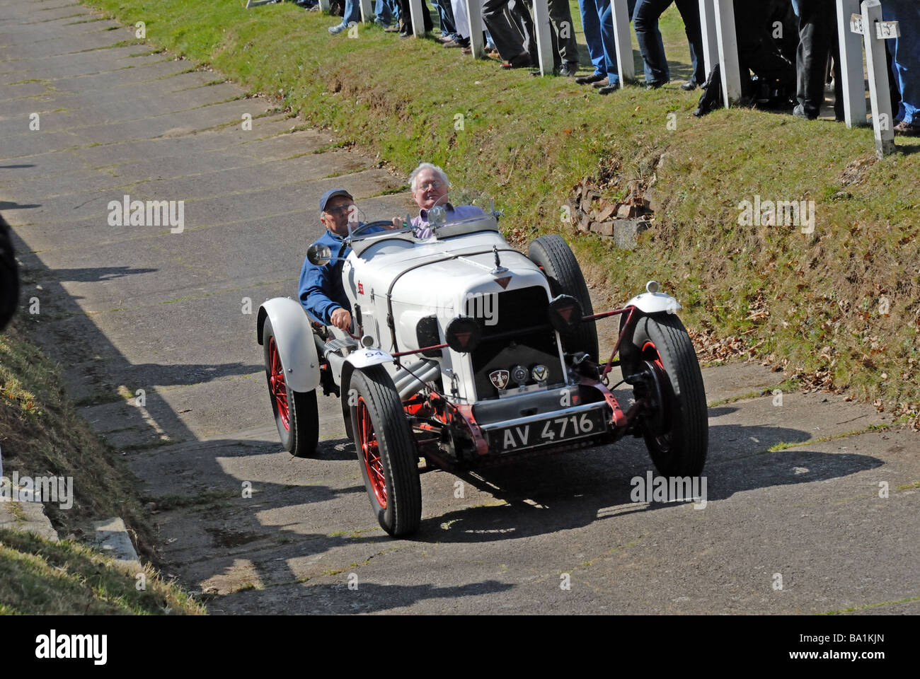 AV 4716 a 1930 Alvis TJ 12 50 Francis Spencer ascending at speed on the Brooklands Museum Test Hill Challenge celebrating the Stock Photo