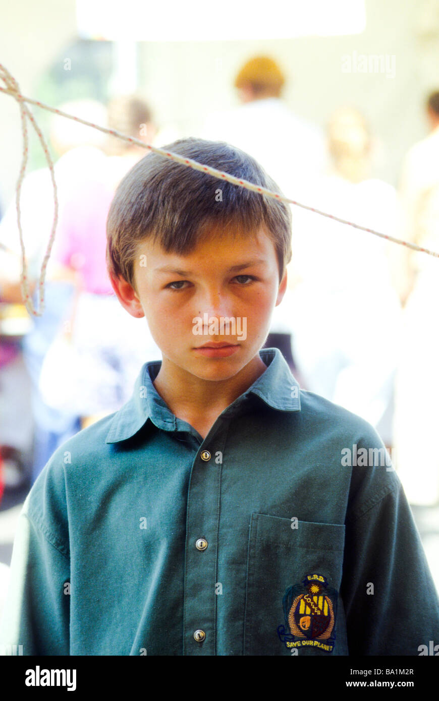Boy serious expression face look stare direct portrait Stock Photo