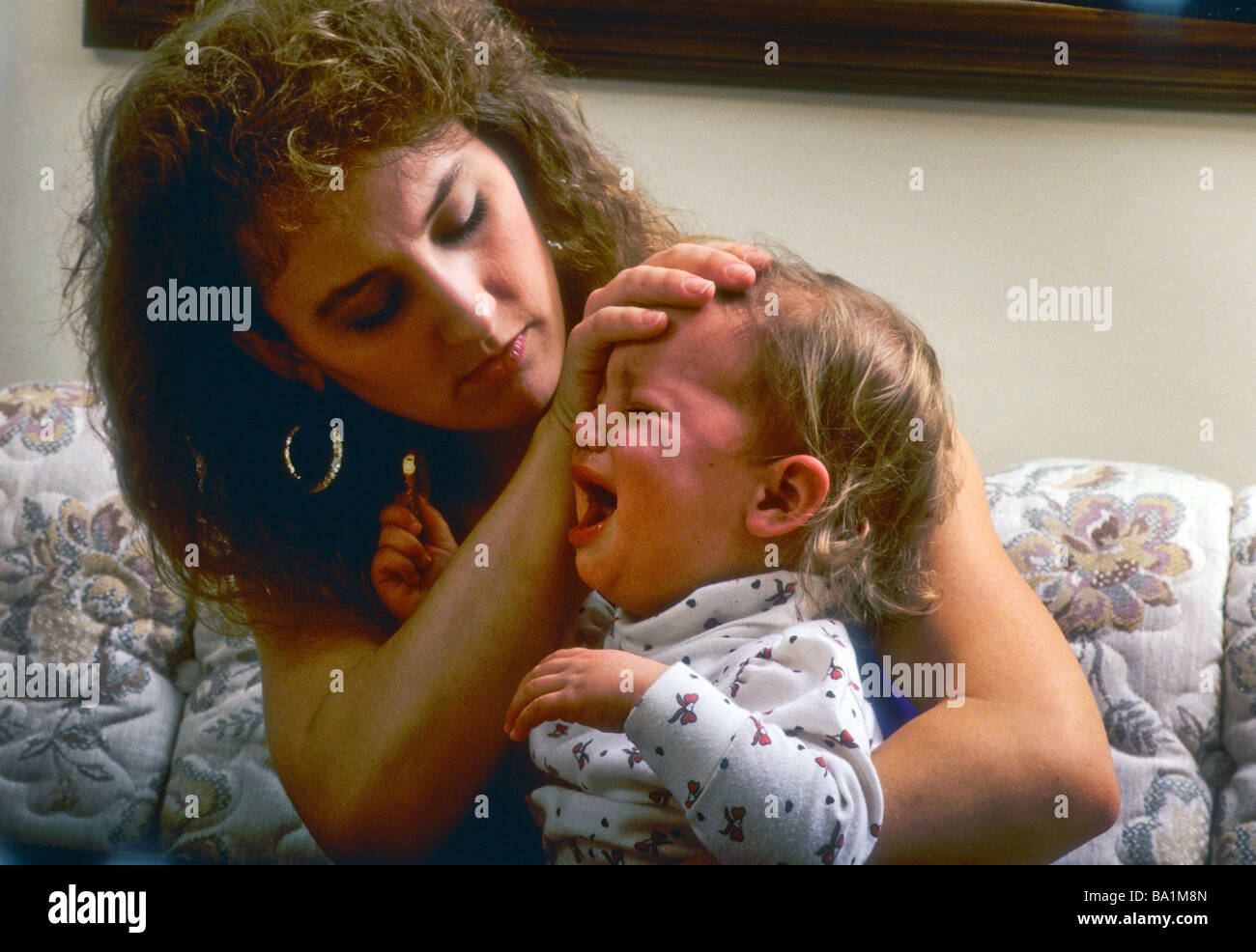 Mother Comfort Baby Child Girl Daughter Fever Sick Ill Cry Pain Hurt Care Concern Love Worry Temp Health Helpless Stock Photo Alamy