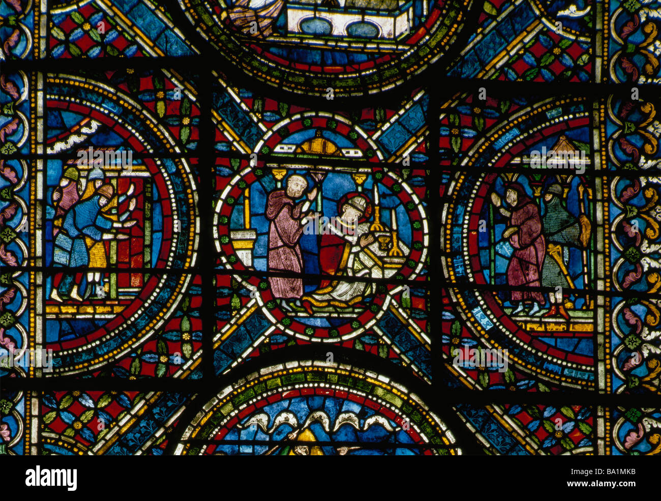 Canterbury Cathedral scenes form life of St Thomas Becket 13thc stained glass Stock Photo