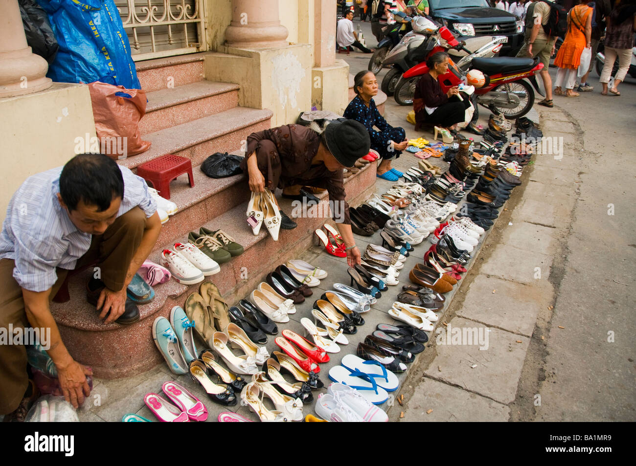 shoe vendors in Hanoi Vietnam Stock Photo Alamy